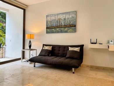 Beautiful 1-bedroom condo in Quetzal, located inside Tulum on  in  - for sale on GolfHomes.com, golf home, golf lot