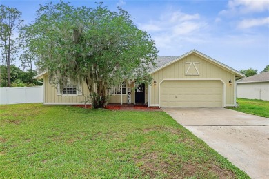 Welcome to this beautifully maintained 3-bedroom, 2-bath home on The Grand Club - Pine Lakes Course in Florida - for sale on GolfHomes.com, golf home, golf lot