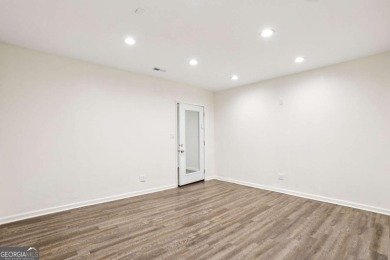 Discover an extraordinary 8,999 square foot sanctuary perfect on Brookstone Golf and Country Club in Georgia - for sale on GolfHomes.com, golf home, golf lot