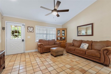 Welcome to this beautifully maintained 3-bedroom, 2-bath home on The Grand Club - Pine Lakes Course in Florida - for sale on GolfHomes.com, golf home, golf lot