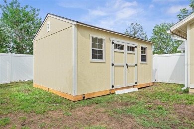Welcome to this beautifully maintained 3-bedroom, 2-bath home on The Grand Club - Pine Lakes Course in Florida - for sale on GolfHomes.com, golf home, golf lot