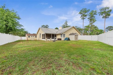 Welcome to this beautifully maintained 3-bedroom, 2-bath home on The Grand Club - Pine Lakes Course in Florida - for sale on GolfHomes.com, golf home, golf lot