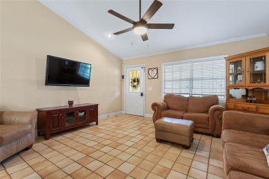 Welcome to this beautifully maintained 3-bedroom, 2-bath home on The Grand Club - Pine Lakes Course in Florida - for sale on GolfHomes.com, golf home, golf lot