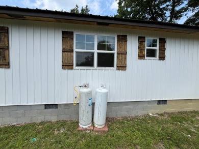 Single Family Residence. Two lots with one newly built home on Pipestem Golf Club - Regulation in West Virginia - for sale on GolfHomes.com, golf home, golf lot