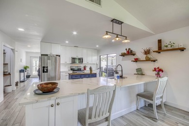 This beautifully updated villa, located in the highly on Heritage Ridge Golf Club in Florida - for sale on GolfHomes.com, golf home, golf lot