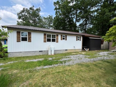 Single Family Residence. Two lots with one newly built home on Pipestem Golf Club - Regulation in West Virginia - for sale on GolfHomes.com, golf home, golf lot