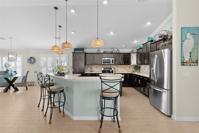 Exquisite WYNDHAM MODEL Oasis in Vibrant MISSION HILLS. Step on The Links of Spruce Creek in Florida - for sale on GolfHomes.com, golf home, golf lot