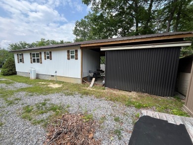Single Family Residence. Two lots with one newly built home on Pipestem Golf Club - Regulation in West Virginia - for sale on GolfHomes.com, golf home, golf lot