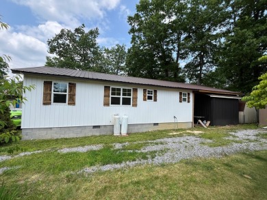 Single Family Residence. Two lots with one newly built home on Pipestem Golf Club - Regulation in West Virginia - for sale on GolfHomes.com, golf home, golf lot