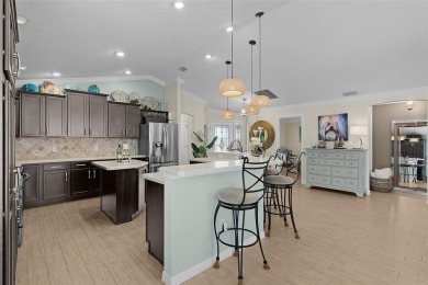 Exquisite WYNDHAM MODEL Oasis in Vibrant MISSION HILLS. Step on The Links of Spruce Creek in Florida - for sale on GolfHomes.com, golf home, golf lot