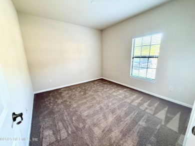 ATTENTION INVESTORS! Ground-floor, 3-bedroom corner unit with on The Palencia Club in Florida - for sale on GolfHomes.com, golf home, golf lot