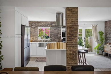 Very rarely does a home offer a sense of calm and harmony that on Miami Springs Golf and Country Club in Florida - for sale on GolfHomes.com, golf home, golf lot