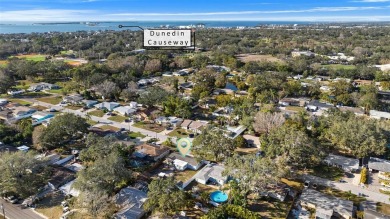 Delightful Dunedin 3bd/1ba gem, NON FLOOD ZONE block home with on The Dunedin Country Club in Florida - for sale on GolfHomes.com, golf home, golf lot