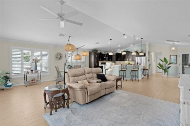 Exquisite WYNDHAM MODEL Oasis in Vibrant MISSION HILLS. Step on The Links of Spruce Creek in Florida - for sale on GolfHomes.com, golf home, golf lot