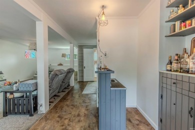 Discover your dream home in this meticulously maintained on Heron Creek Golf Club in Indiana - for sale on GolfHomes.com, golf home, golf lot