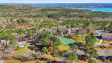 Welcome to this gorgeously remodeled Cliffside Lodge condo with on  in Arkansas - for sale on GolfHomes.com, golf home, golf lot