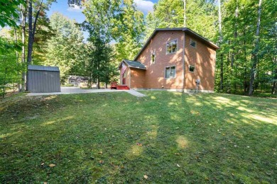 Welcome to this charming Harbor Springs home, perfectly situated on Boyne Highlands Golf Courses in Michigan - for sale on GolfHomes.com, golf home, golf lot