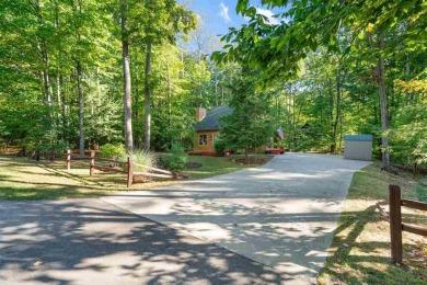 Welcome to this charming Harbor Springs home, perfectly situated on Boyne Highlands Golf Courses in Michigan - for sale on GolfHomes.com, golf home, golf lot