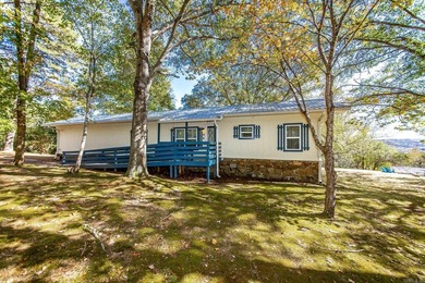 Adorable furnished getaway near the Middle Fork River of Greers on  in Arkansas - for sale on GolfHomes.com, golf home, golf lot