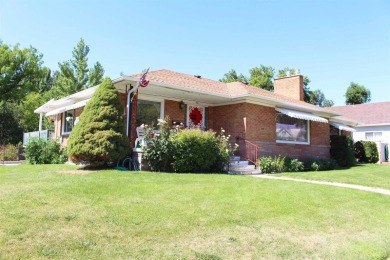 This beautiful brick home has 4 Bedrooms, 2 1/2 Bathrooms, a 2 on American Falls Golf Course in Idaho - for sale on GolfHomes.com, golf home, golf lot