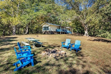 Adorable furnished getaway near the Middle Fork River of Greers on  in Arkansas - for sale on GolfHomes.com, golf home, golf lot
