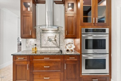 This custom-designed all brick estate on 1.2 acres offers nearly on Chicora Golf Course in North Carolina - for sale on GolfHomes.com, golf home, golf lot