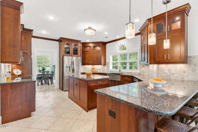 This custom-designed all brick estate on 1.2 acres offers nearly on Chicora Golf Course in North Carolina - for sale on GolfHomes.com, golf home, golf lot