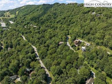 GREAT PRICE ON A LONG RANGE VIEW LOT! CONVENIENT CENTRAL on Beech Mountain Club in North Carolina - for sale on GolfHomes.com, golf home, golf lot