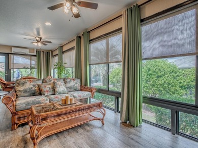 Surrounded by lush, mature landscaping, this beautiful Aspen- on The Links of Spruce Creek in Florida - for sale on GolfHomes.com, golf home, golf lot