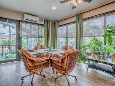 Surrounded by lush, mature landscaping, this beautiful Aspen- on The Links of Spruce Creek in Florida - for sale on GolfHomes.com, golf home, golf lot