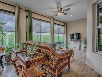 Surrounded by lush, mature landscaping, this beautiful Aspen- on The Links of Spruce Creek in Florida - for sale on GolfHomes.com, golf home, golf lot