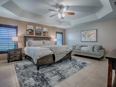 Surrounded by lush, mature landscaping, this beautiful Aspen- on The Links of Spruce Creek in Florida - for sale on GolfHomes.com, golf home, golf lot