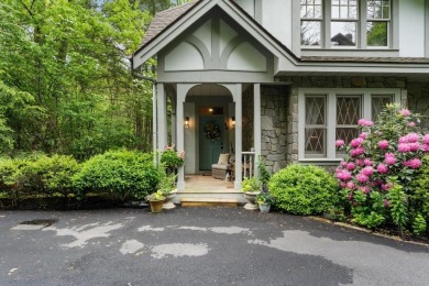 This charming bungalow is nestled in the woods within the quiet on Trillium Links in North Carolina - for sale on GolfHomes.com, golf home, golf lot