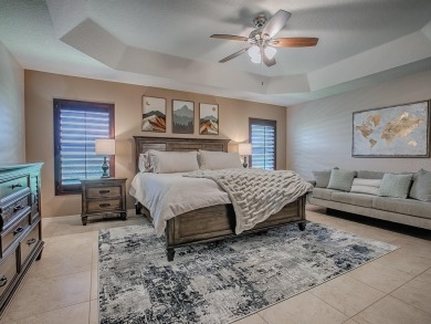 Surrounded by lush, mature landscaping, this beautiful Aspen- on The Links of Spruce Creek in Florida - for sale on GolfHomes.com, golf home, golf lot