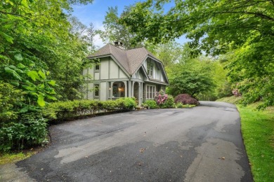 This charming bungalow is nestled in the woods within the quiet on Trillium Links in North Carolina - for sale on GolfHomes.com, golf home, golf lot