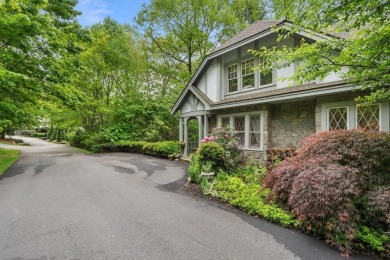 This charming bungalow is nestled in the woods within the quiet on Trillium Links in North Carolina - for sale on GolfHomes.com, golf home, golf lot