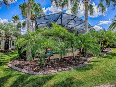 Surrounded by lush, mature landscaping, this beautiful Aspen- on The Links of Spruce Creek in Florida - for sale on GolfHomes.com, golf home, golf lot