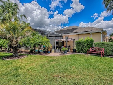 Surrounded by lush, mature landscaping, this beautiful Aspen- on The Links of Spruce Creek in Florida - for sale on GolfHomes.com, golf home, golf lot