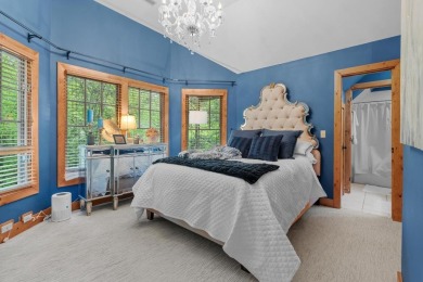 This charming bungalow is nestled in the woods within the quiet on Trillium Links in North Carolina - for sale on GolfHomes.com, golf home, golf lot