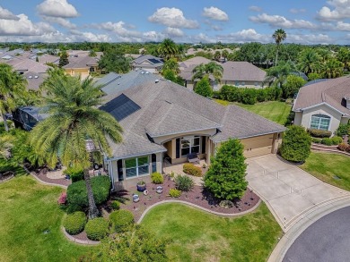 Surrounded by lush, mature landscaping, this beautiful Aspen- on The Links of Spruce Creek in Florida - for sale on GolfHomes.com, golf home, golf lot