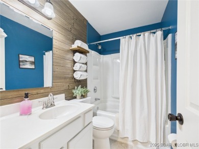 Stunning 4-Bedroom Home with Seasonal Lake Views & Strong Rental on The Oaks Golf Course in Missouri - for sale on GolfHomes.com, golf home, golf lot