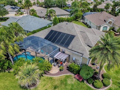 Surrounded by lush, mature landscaping, this beautiful Aspen- on The Links of Spruce Creek in Florida - for sale on GolfHomes.com, golf home, golf lot