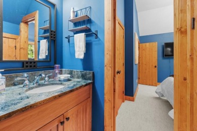 This charming bungalow is nestled in the woods within the quiet on Trillium Links in North Carolina - for sale on GolfHomes.com, golf home, golf lot