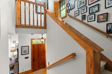 This charming bungalow is nestled in the woods within the quiet on Trillium Links in North Carolina - for sale on GolfHomes.com, golf home, golf lot