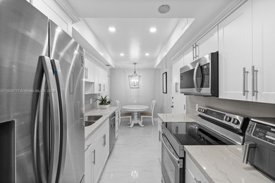 This beautifully updated 3 bed/2 bath offers a large layout of on Pembroke Lakes Golf Club in Florida - for sale on GolfHomes.com, golf home, golf lot