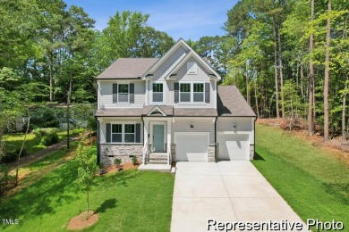 This semi-custom home in the gated, resort-style Lake Royale on River Golf and County Club at Lake Royale in North Carolina - for sale on GolfHomes.com, golf home, golf lot