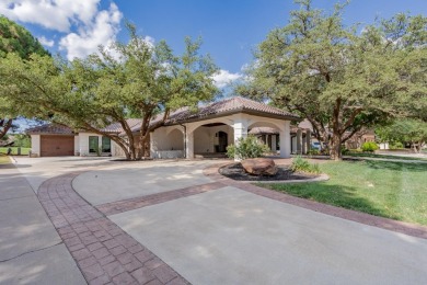 Immerse yourself in refined elegance at 4712 96th Street. This on LakeRidge Country Club in Texas - for sale on GolfHomes.com, golf home, golf lot