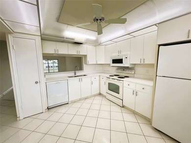 PENTHOUSE with Spectacular GOLF/WATER/FOUNTAIN/CLUBHOUSE VIEW on Wynmoor Golf Course in Florida - for sale on GolfHomes.com, golf home, golf lot