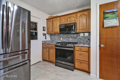 Lovely Golf Course home! Home is on two combined lots for one on Lake Tansi Village Country Club in Tennessee - for sale on GolfHomes.com, golf home, golf lot