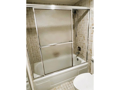 PENTHOUSE with Spectacular GOLF/WATER/FOUNTAIN/CLUBHOUSE VIEW on Wynmoor Golf Course in Florida - for sale on GolfHomes.com, golf home, golf lot